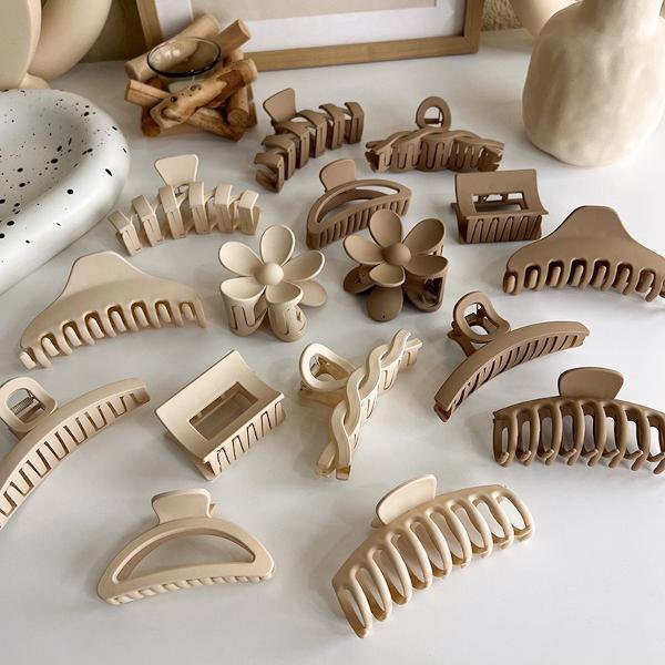 Melkachtige koffie kleurtoon klauw haarclips