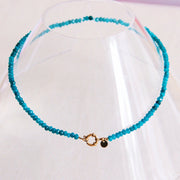 halsketting-blauw-goud-kralen