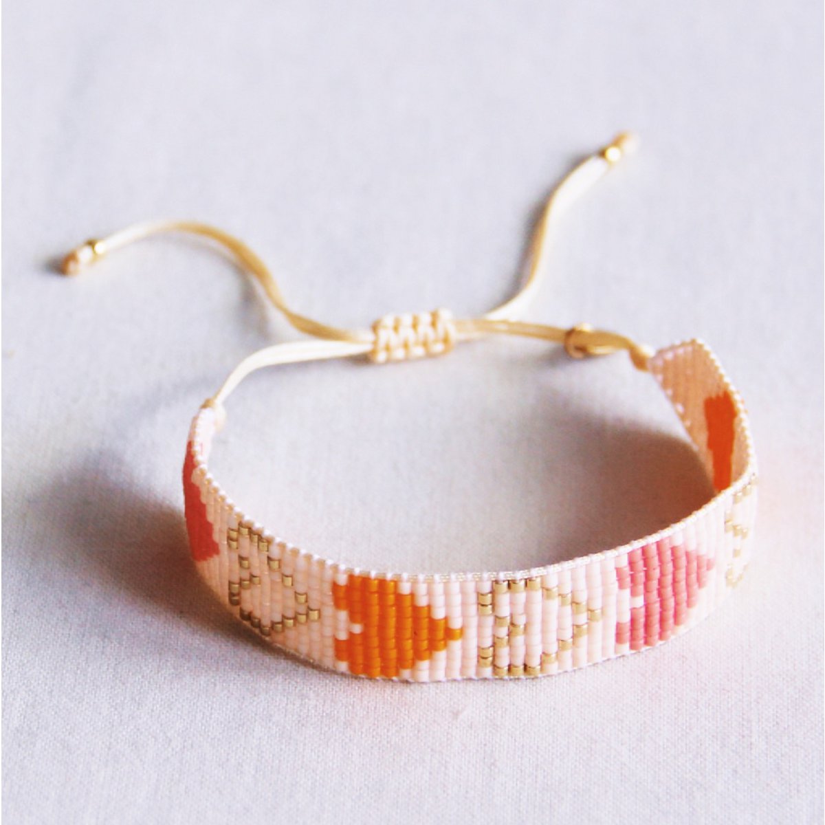Hart geweven armband - nude/oranje/zalm