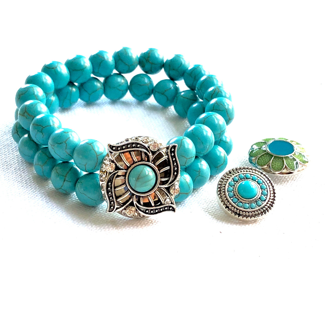 Armband dubbel kralen clicks /buttons turquoise