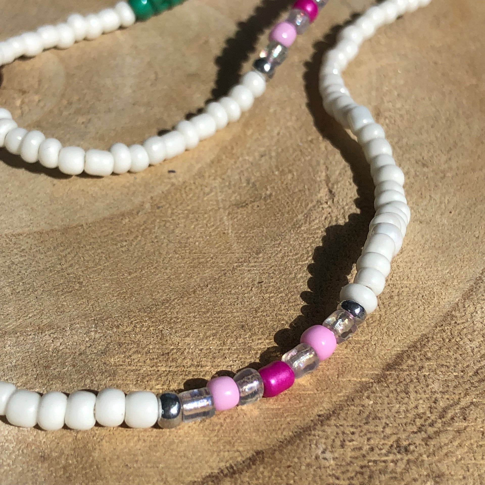 Brillenkoordje wit-roze-bloem