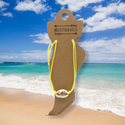 Enkelbandje schelp geel