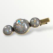 Hairclip cabochon gold color flakes - grijs