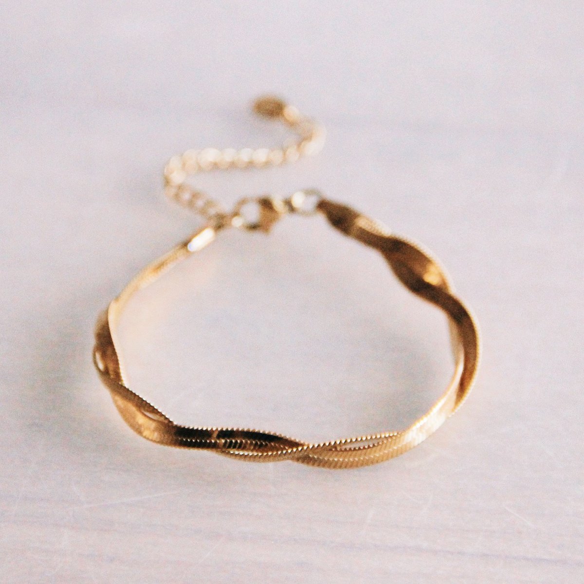 SA860 - Roestvrijstalen gevlochten slangenarmband - goud