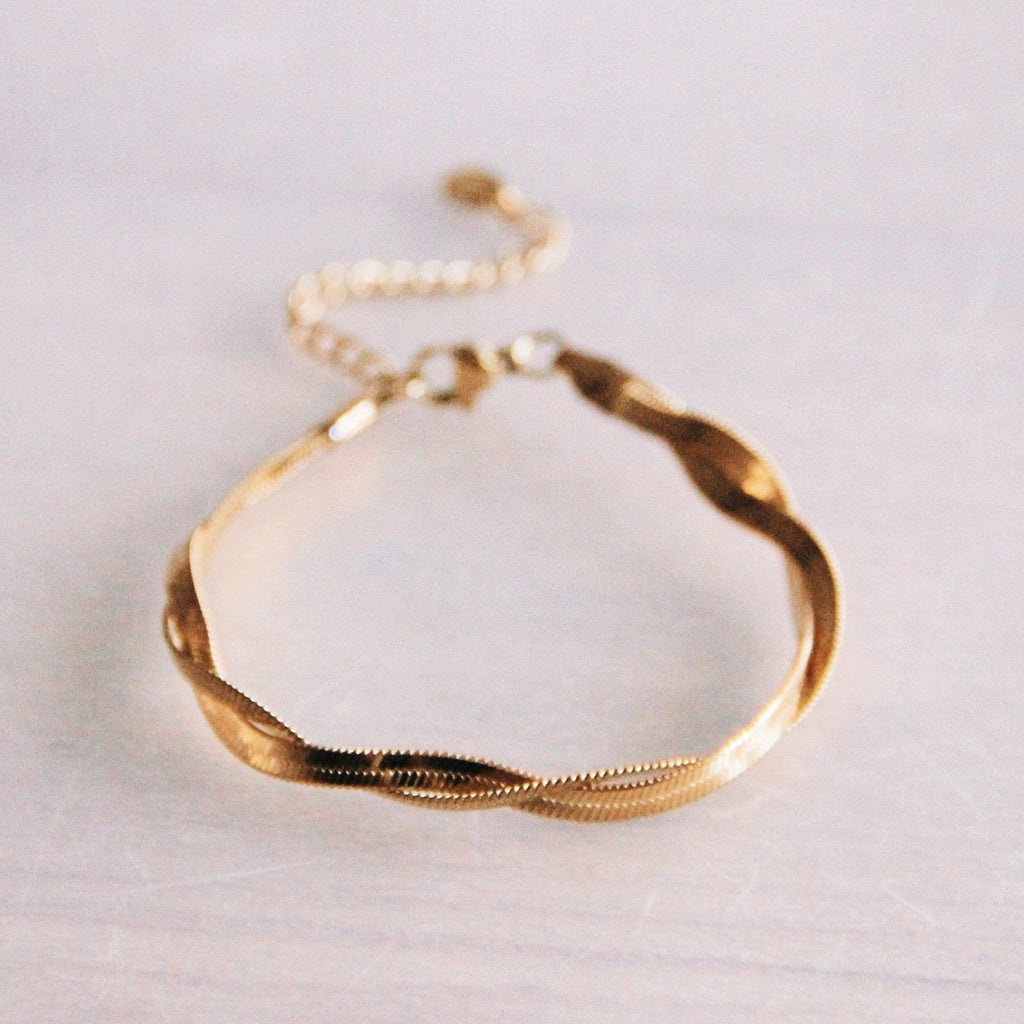 SA860 - Roestvrijstalen gevlochten slangenarmband - goud