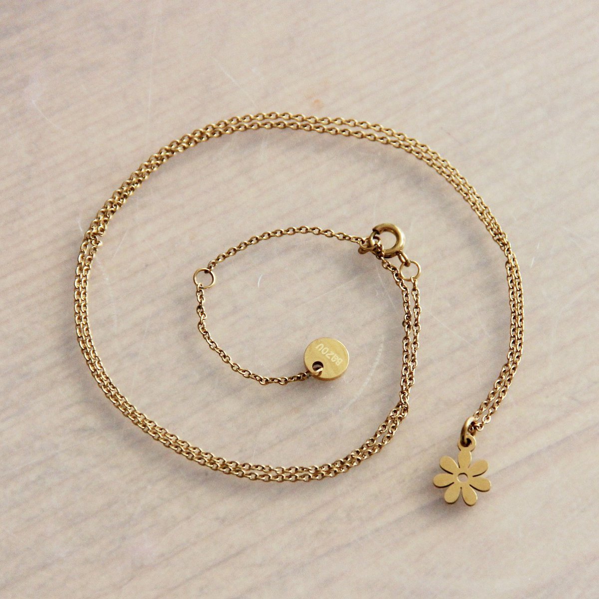 SS211 - RVS fijne ketting met mini bloem - goud